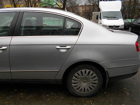 Заднее левое крыло и дверь Volkswagen Passat после покраски