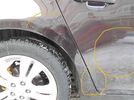Повреждение на заднем крыле Chevrolet Cruze
