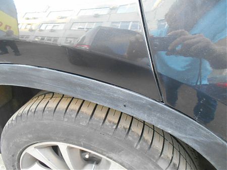 Восстановленный участок лакокрасочного покрытия заднего крыла BMW X6