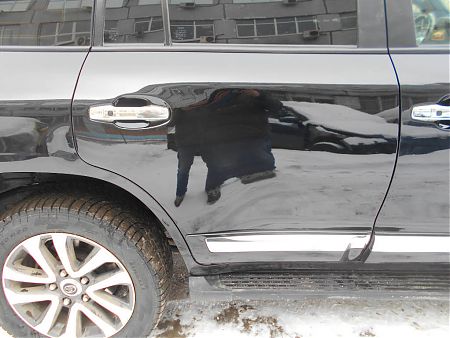 Вид двери Toyota Land Cruiser после устранения повреждений
